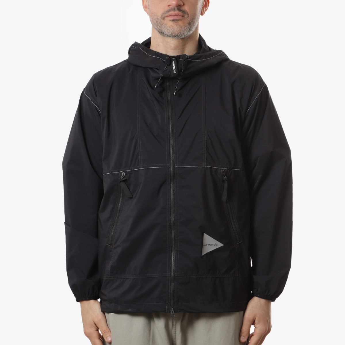 And Wander Pertex Wind Jacket, Black, Detail Shot 1