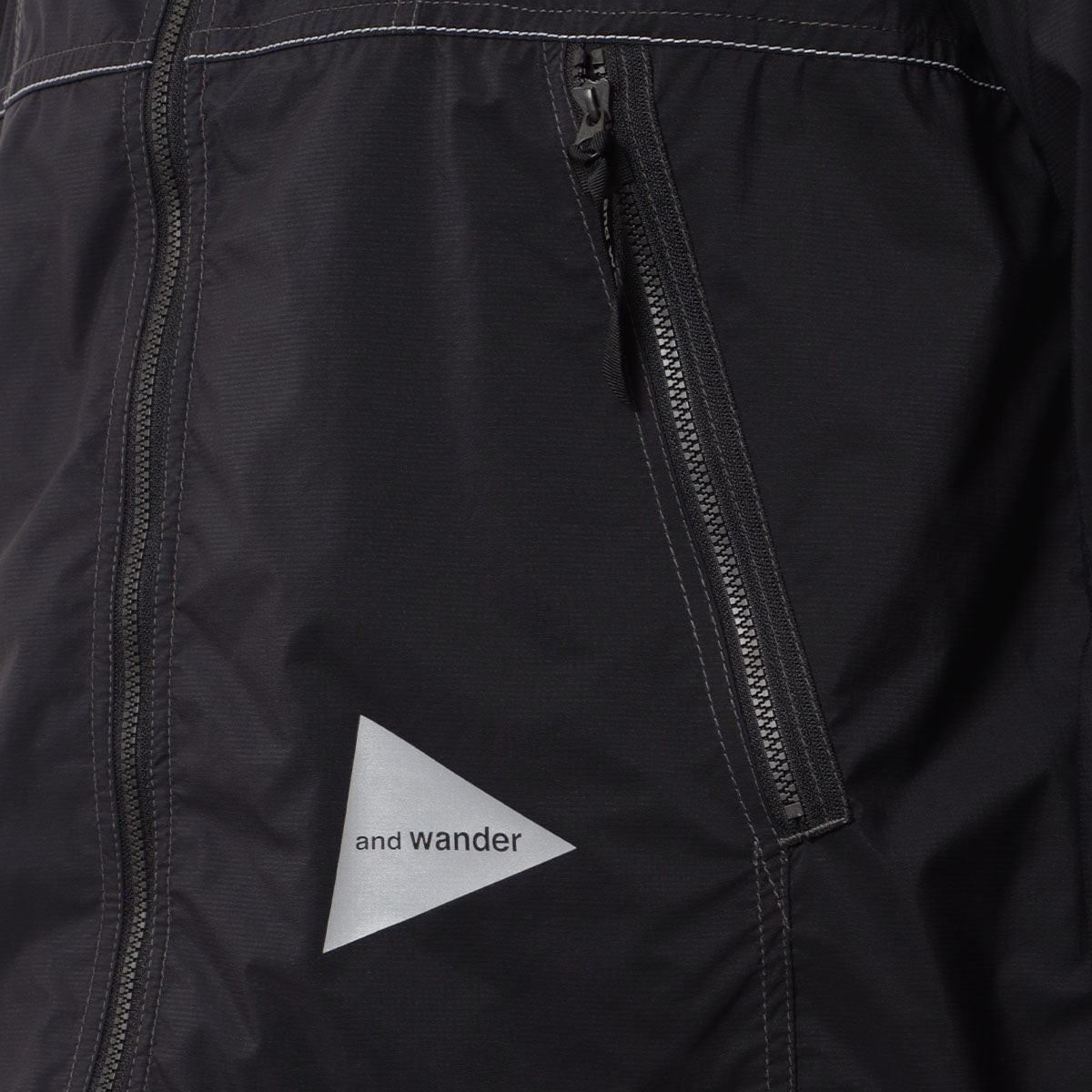 And Wander Pertex Wind Jacket, Black, Detail Shot 2