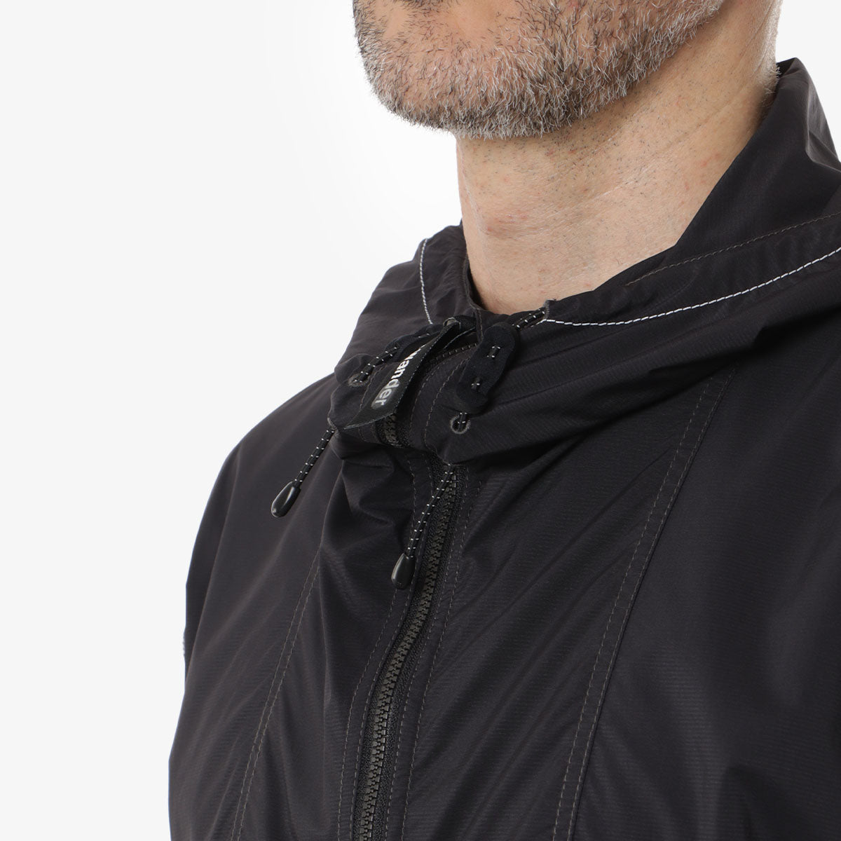 And Wander Pertex Wind Jacket, Black, Detail Shot 3