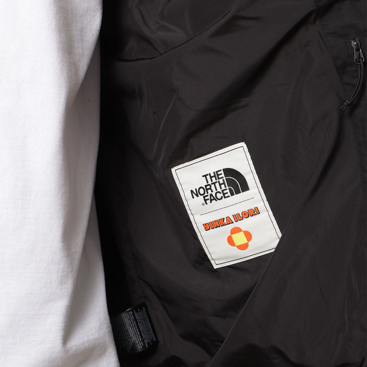 main The North Face x Yinka Ilori 2L Rainshell Jacket, TNF Black Solar Blue, Detail Shot 9