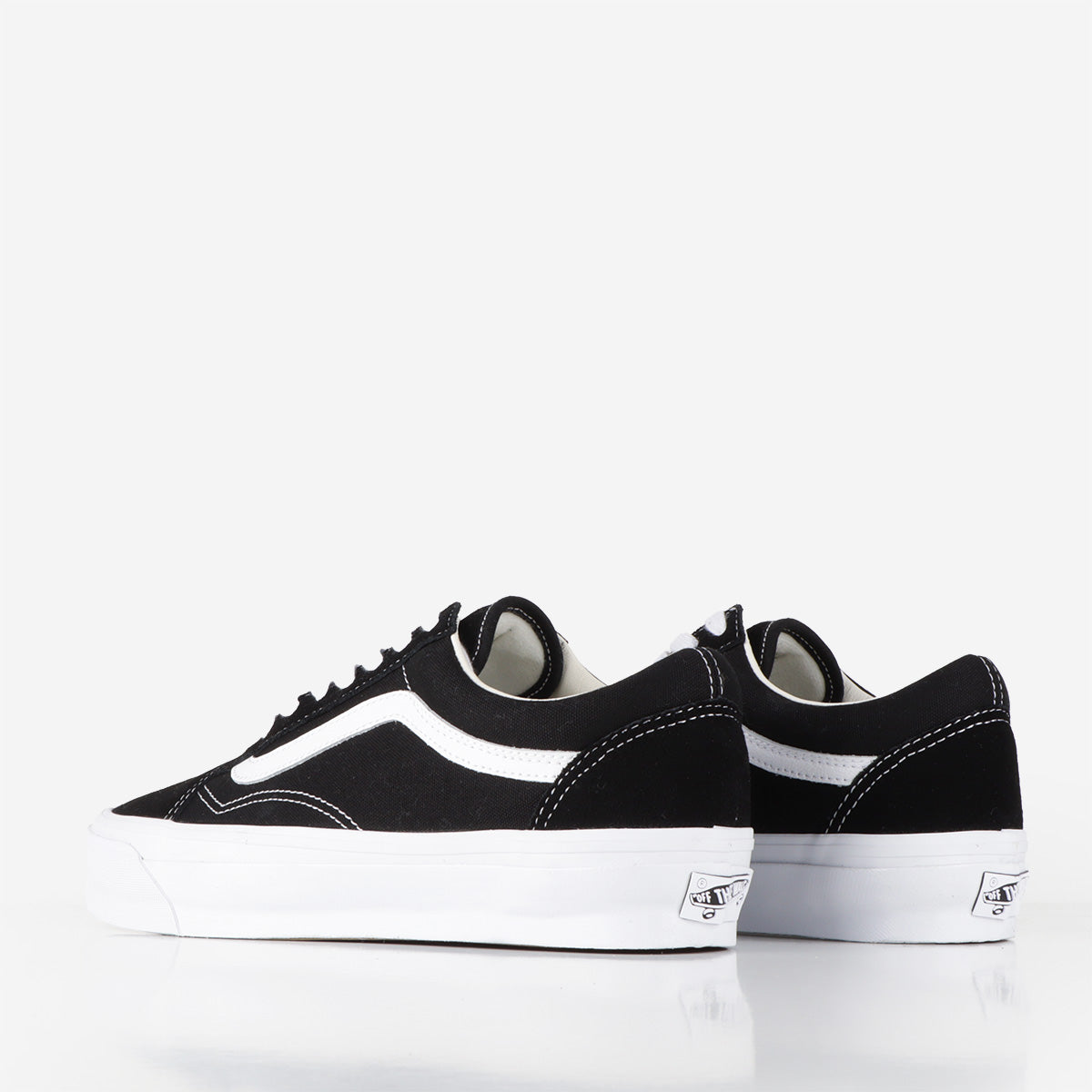 Black and white vans off the wall best sale